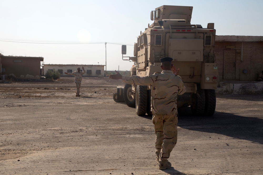 Iraqi Army Soldiers train on mine sweeping and vehicle maintenance