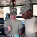 Army Reserve cook mentors junior cook during competition