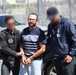 Murder suspect returned to Mexico