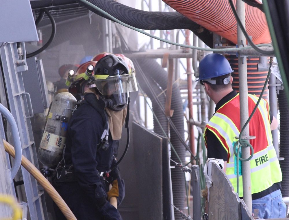 USS Tornado firefighters drill