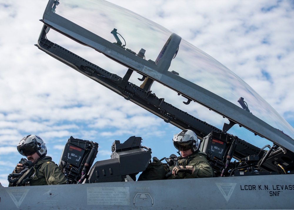 Electronic Attack Squadron 139 aircrew conduct a pre-flight check