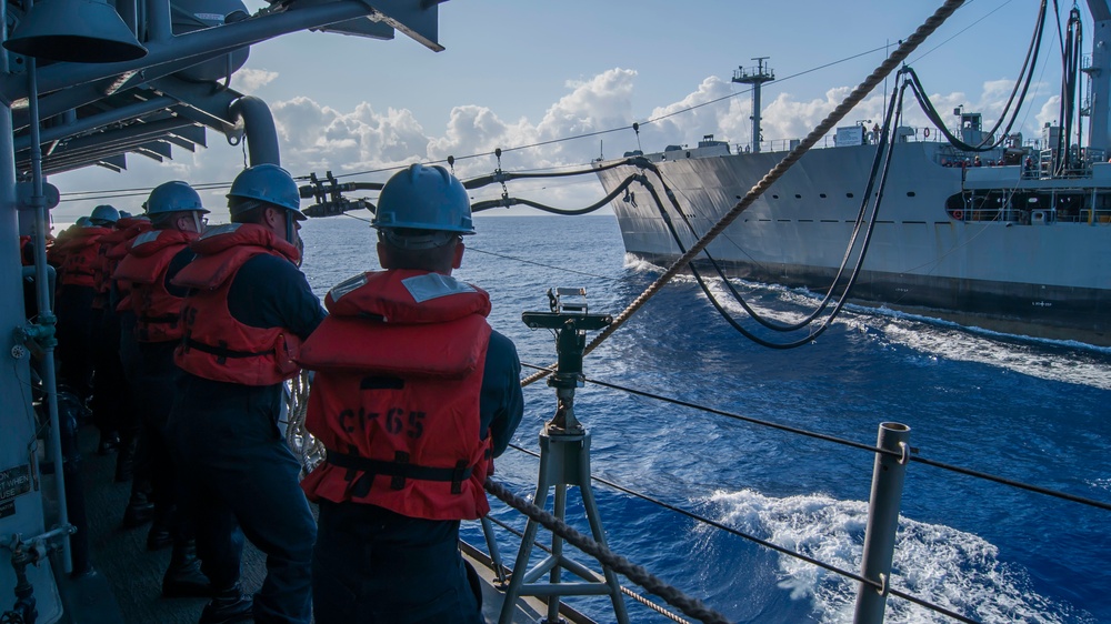 USS Chosin chiefs heave around a line