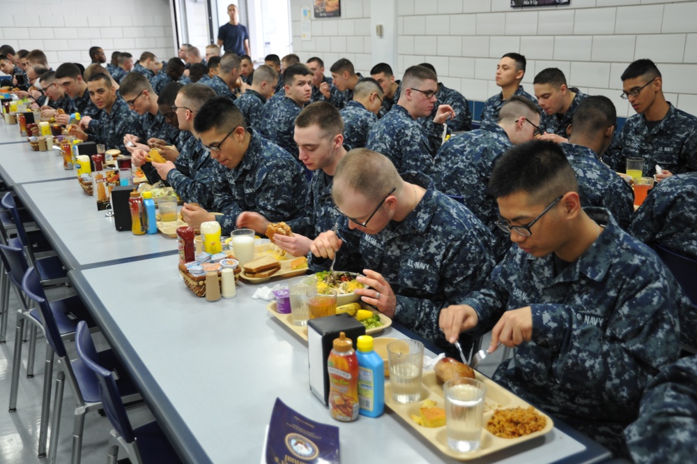 Navy recruits dine in the galley