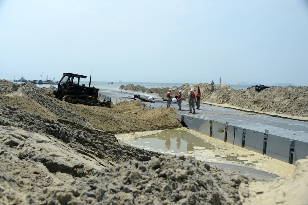 Service members place Trident Pier on Korean Peninsula during Exercise CJLOTS 2015