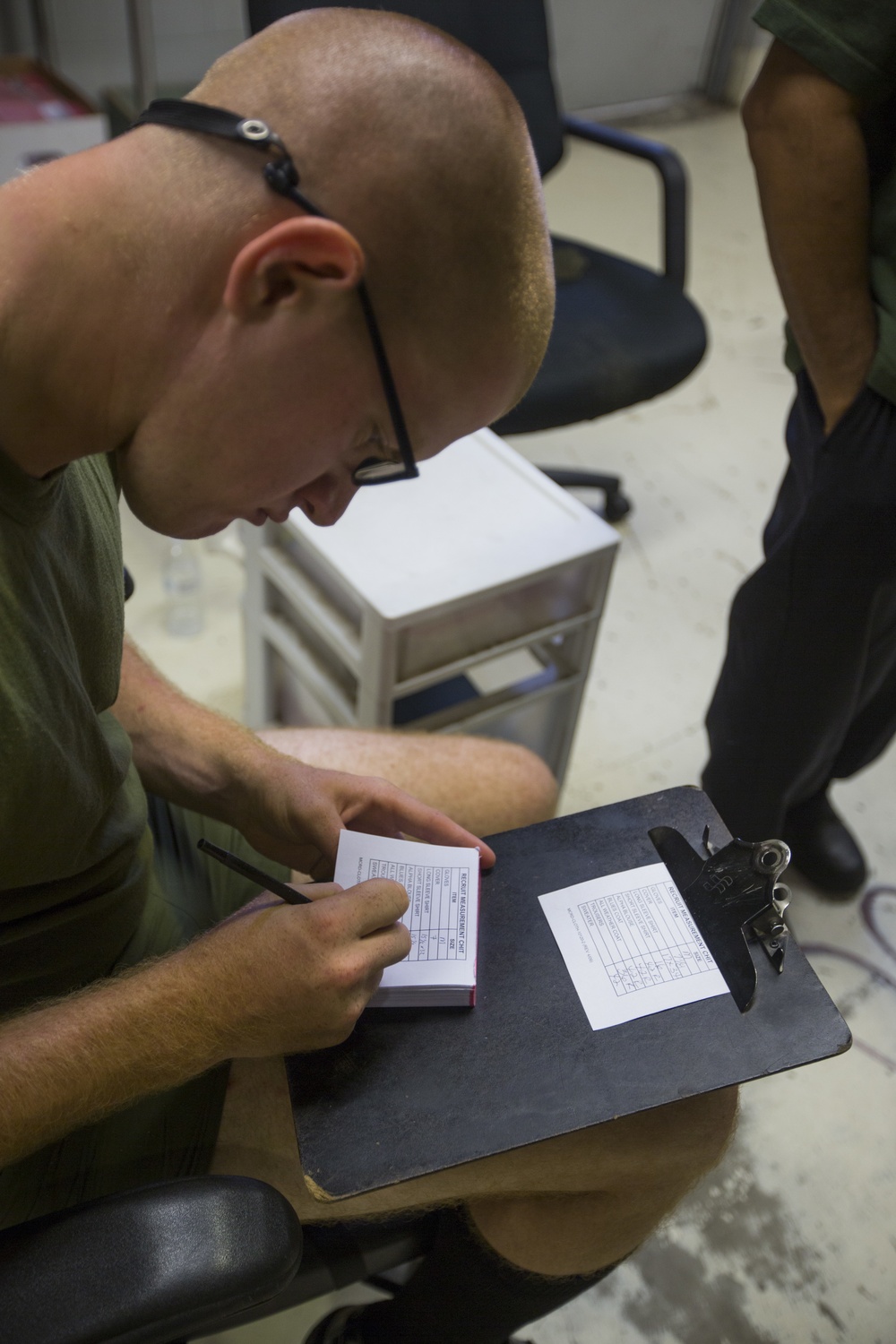 Marine recruits get fitted for the Corps’ uniforms on Parris Island