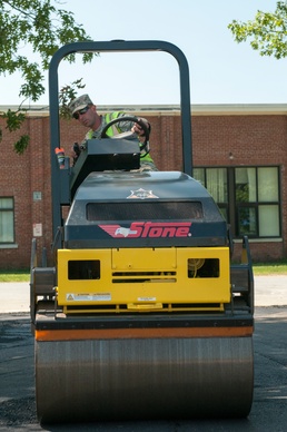 Engineer rolls parking lot