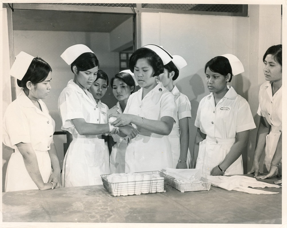 Nursing Instructor Giving a Demonstration in First Aid