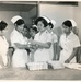 Nursing Instructor Giving a Demonstration in First Aid