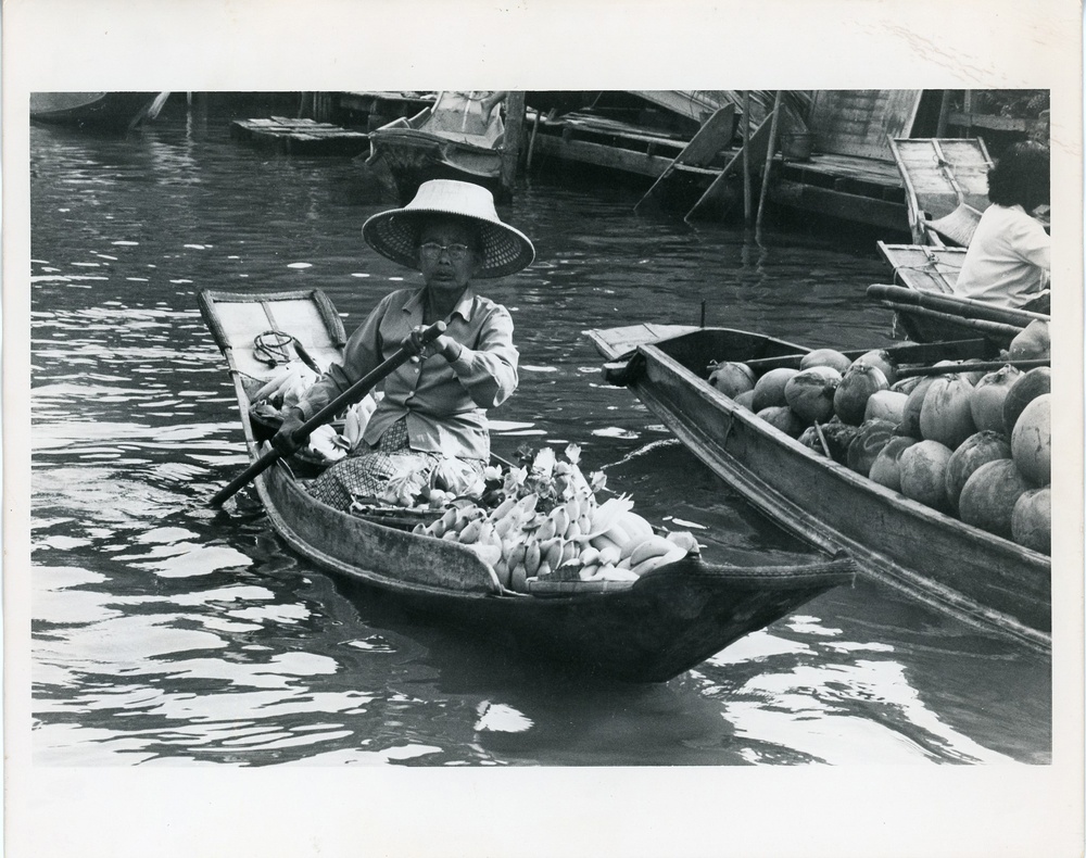 Woman in a paddling a boat