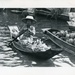 Woman in a paddling a boat