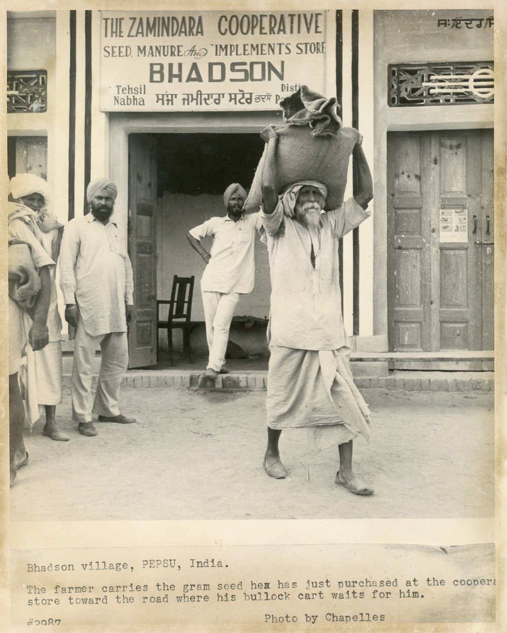 A Farmer Carrying Gram Seed