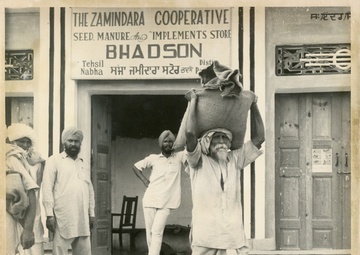 A Farmer Carrying Gram Seed