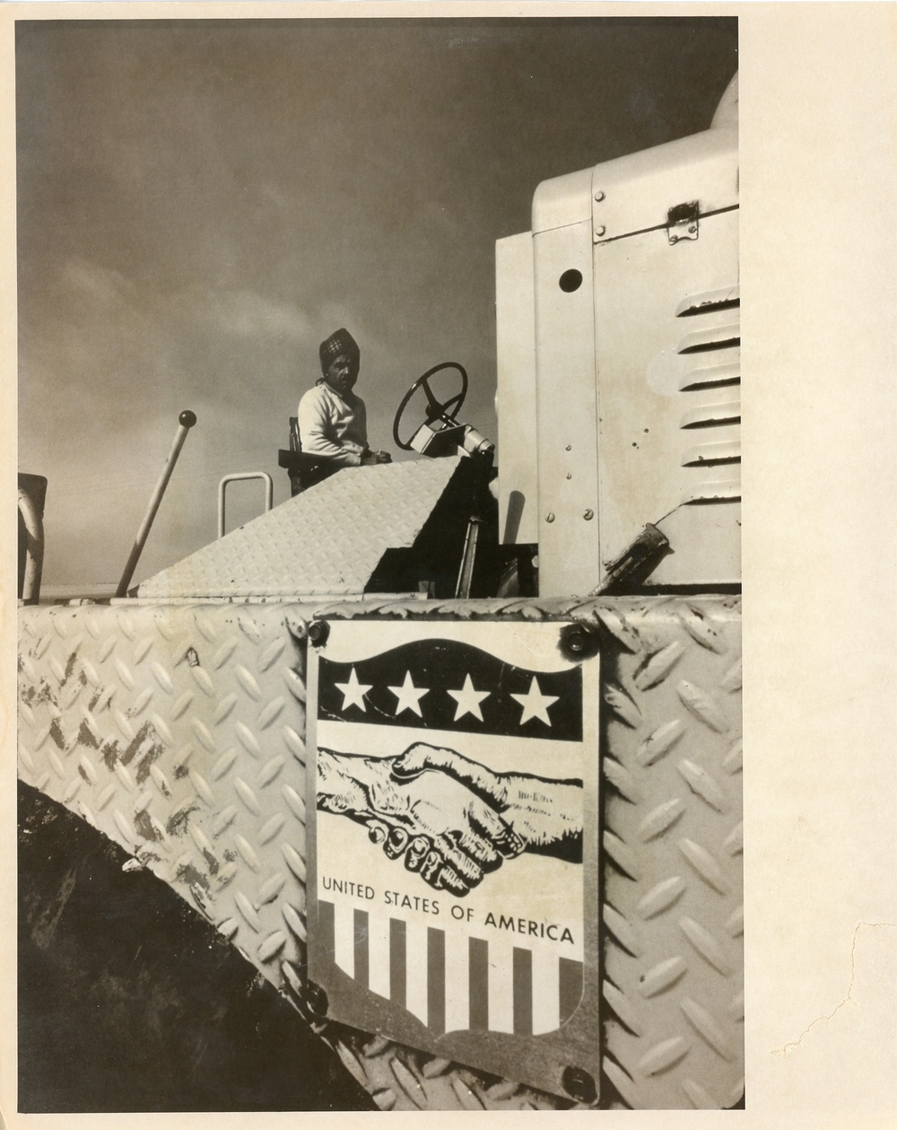 Man atop heavy machinery