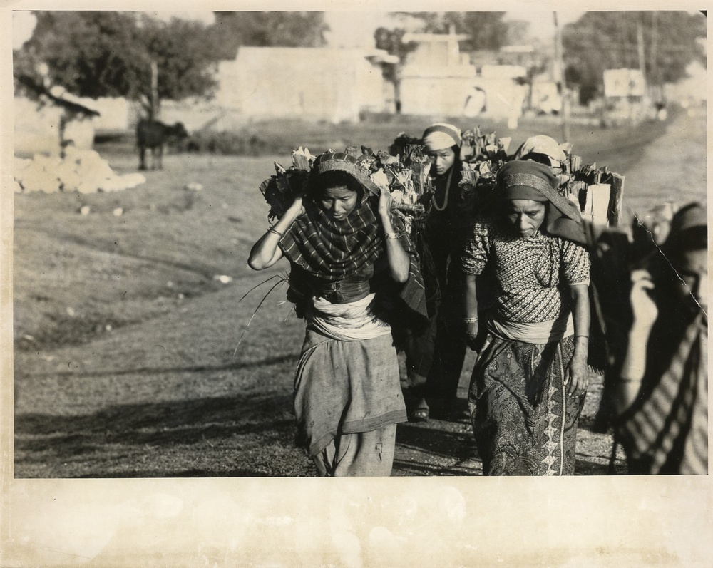 Women transporting goods