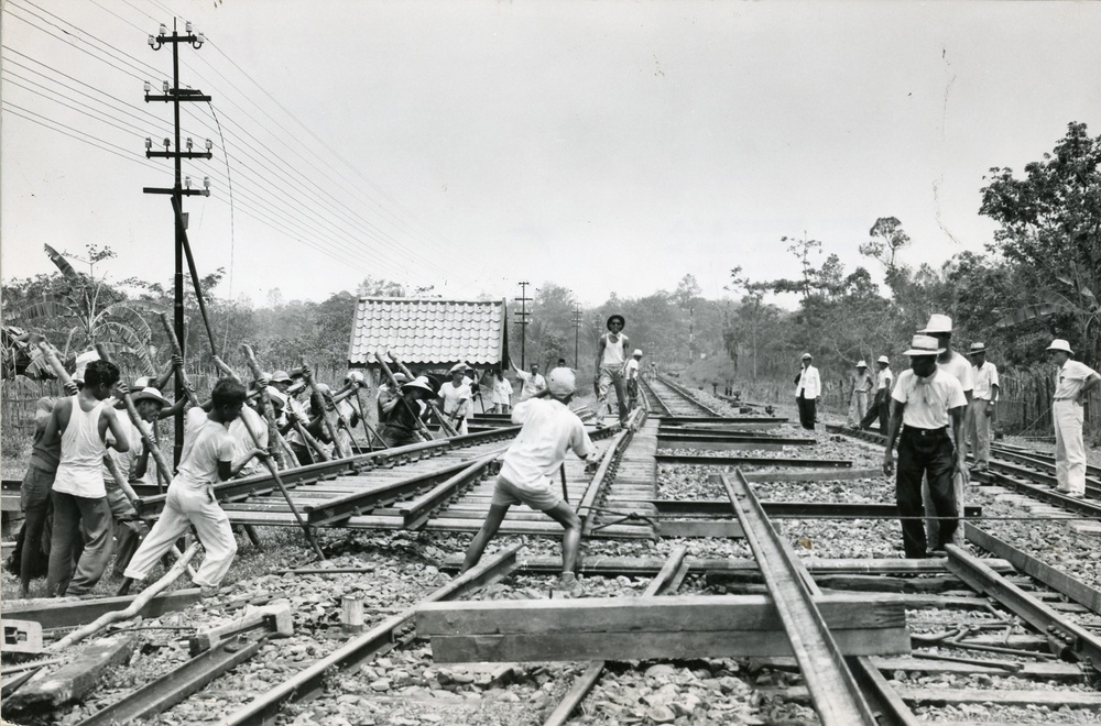 Men Installing a New Switch