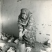 Woman feeding chickens