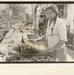 Woman gathering peas