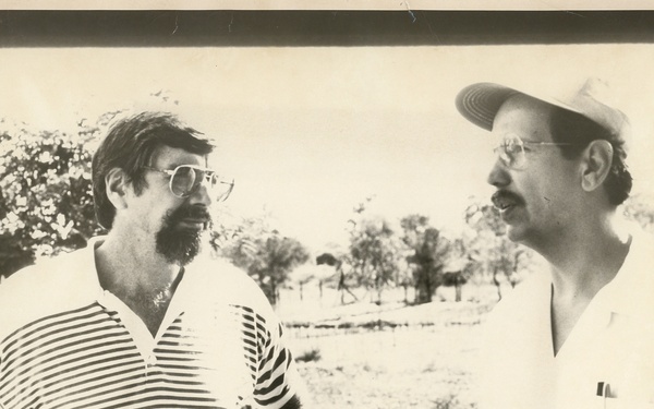 Two men in conversation