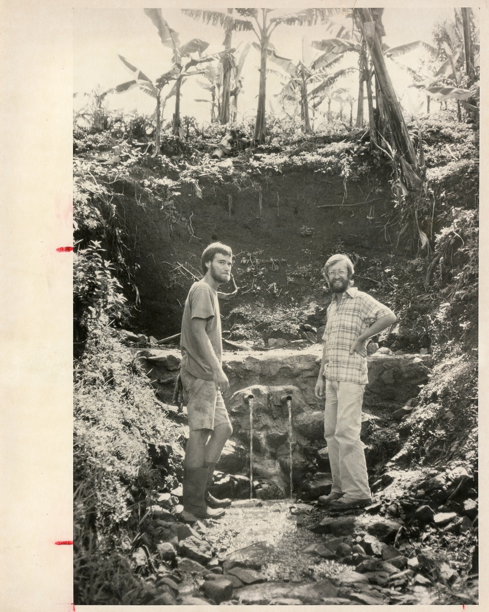 Two Men Posing with the Capped Springs