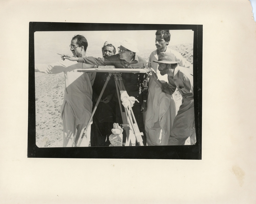 Men surveying land