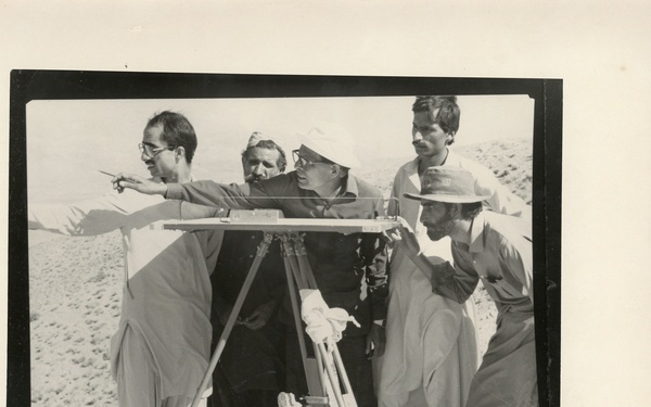 Men surveying land