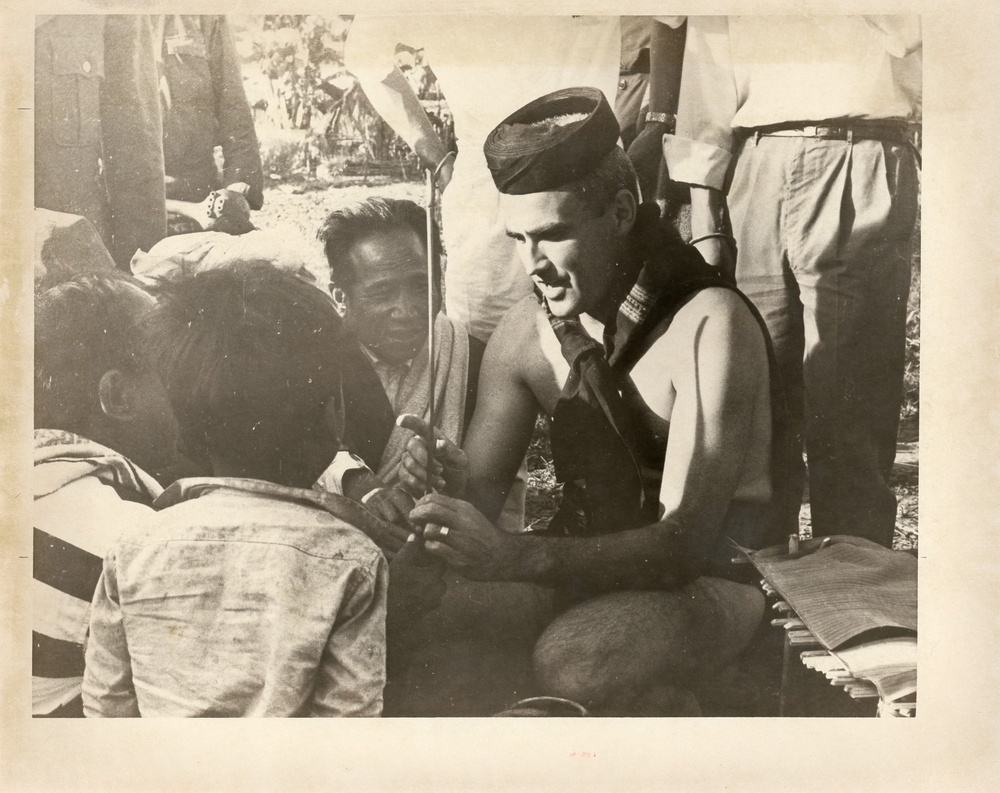 Man teaching children