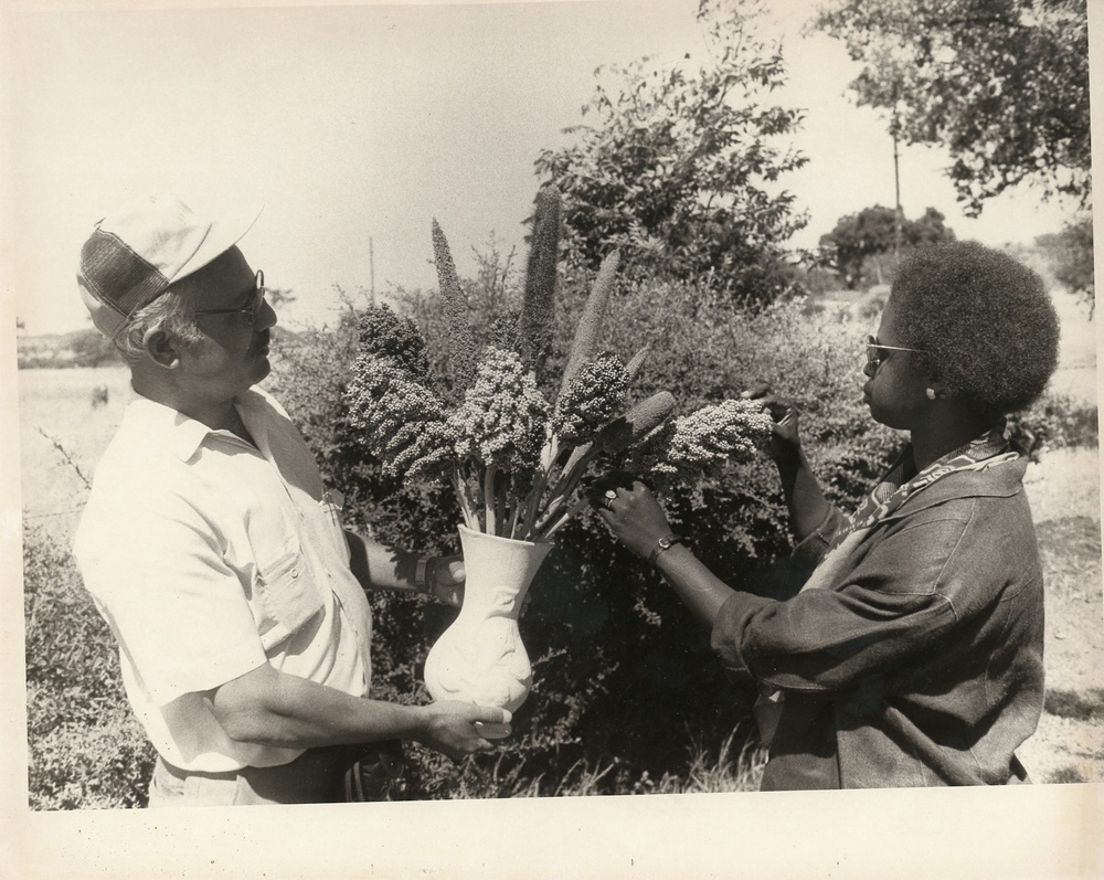 Man and woman making a flower arrangement