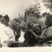 Man and woman making a flower arrangement