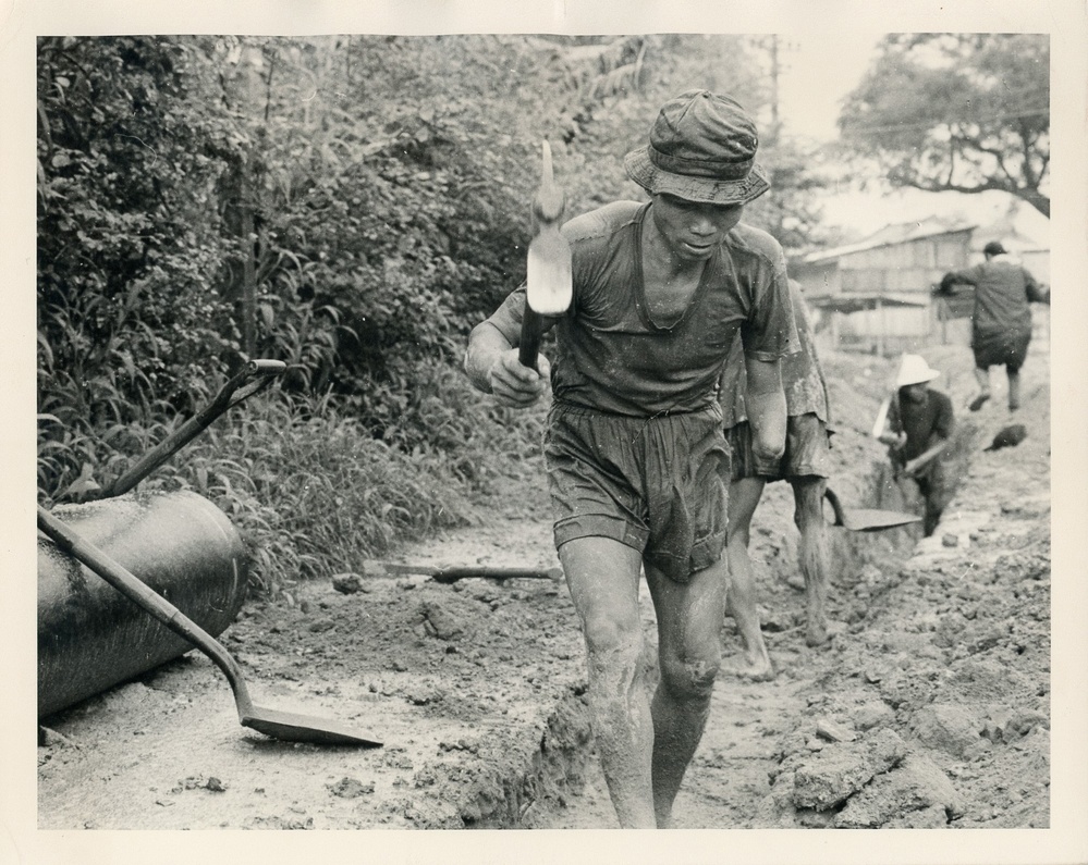Men digging a trench