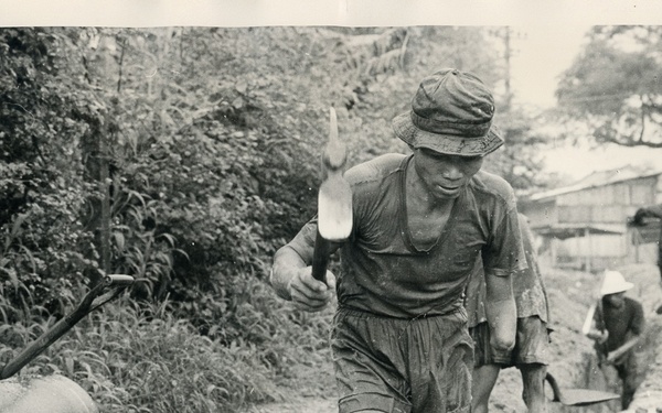 Men digging a trench