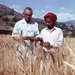 Two men in a field of wheat