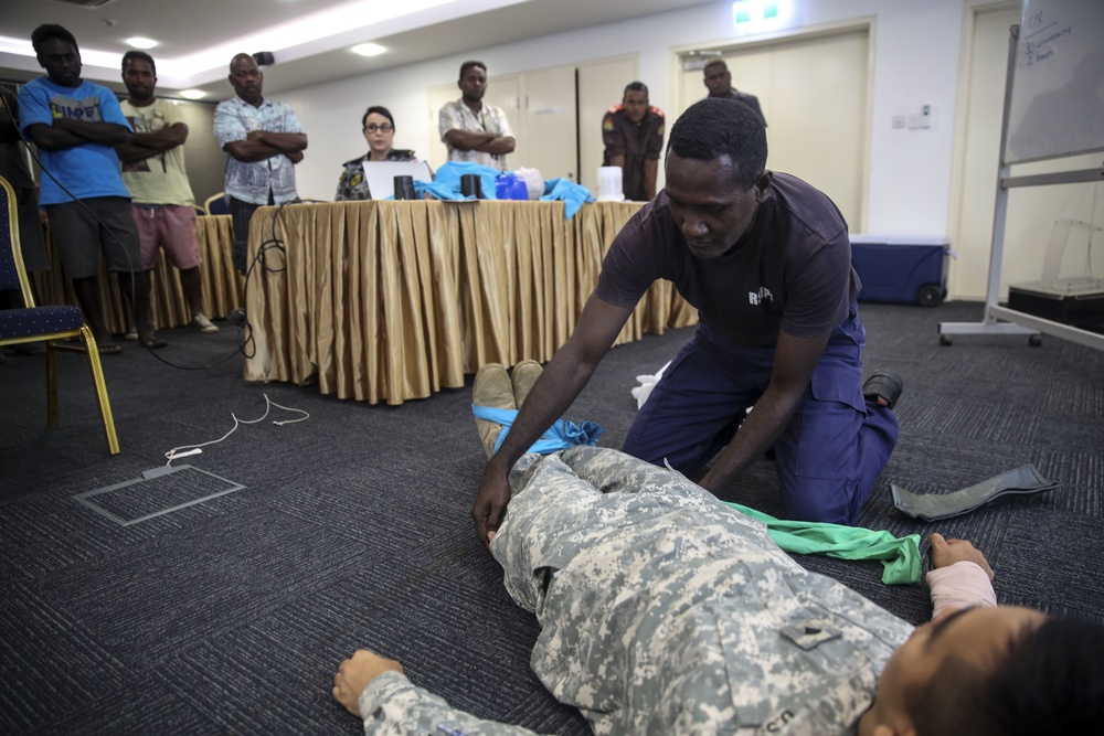 Pacific Partnership service members conduct first aid course for local taxi drivers