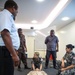 Pacific Partnership service members conduct first aid course for local taxi drivers