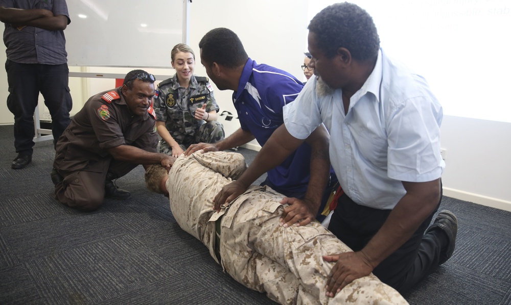 Pacific Partnership service members conduct first aid course for local taxi drivers