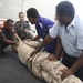 Pacific Partnership service members conduct first aid course for local taxi drivers