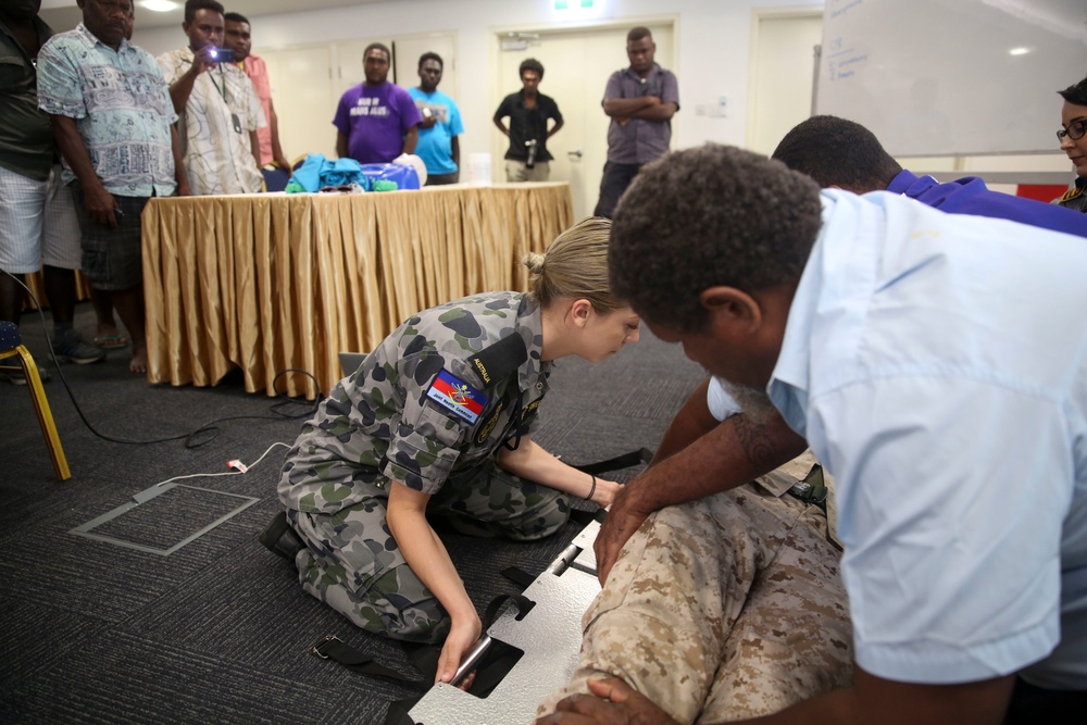 Pacific Partnership service members conduct first aid course for local taxi drivers