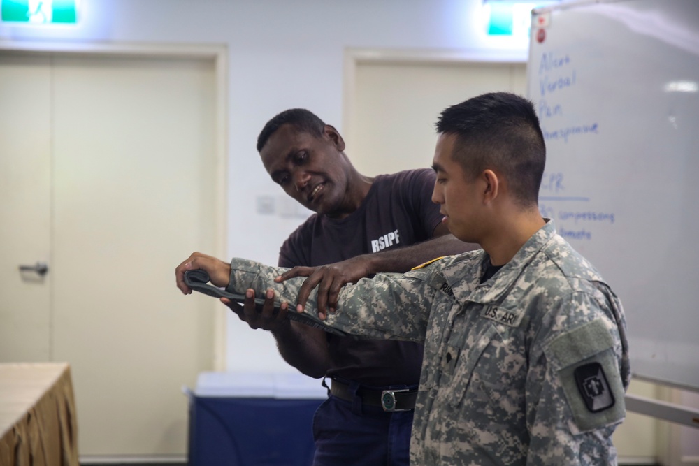 Pacific Partnership service members conduct first aid course for local taxi drivers
