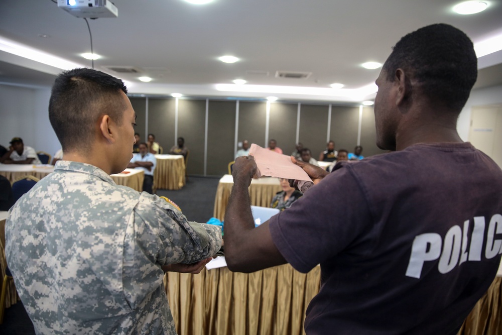 Pacific Partnership service members conduct first aid course for local taxi drivers