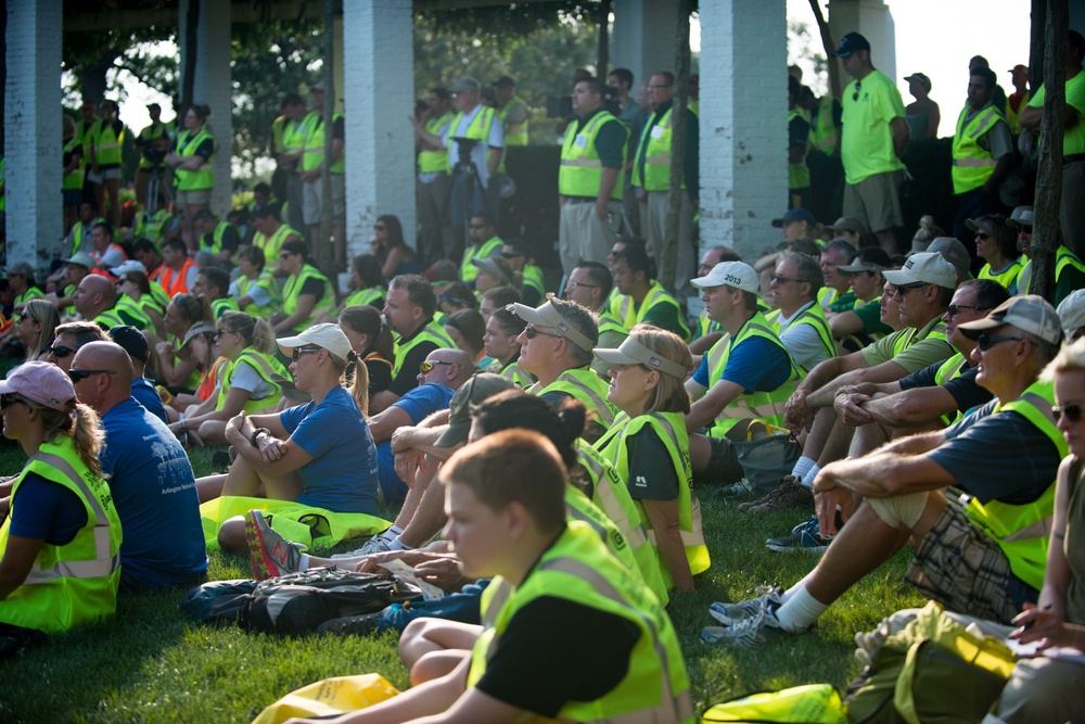 Volunteers work during the National Association of Landscape Professionals’ 19th annual Renewal and Remembrance at Arlington National Cemetery