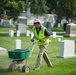 Volunteers work during the National Association of Landscape Professionals’ 19th annual Renewal and Remembrance at Arlington National Cemetery