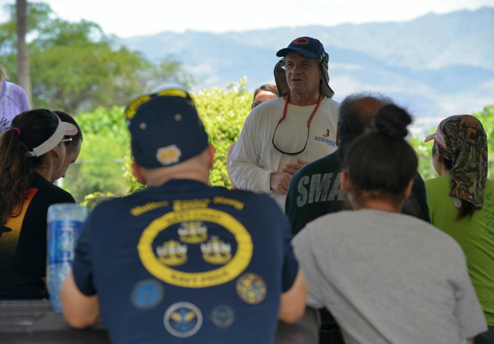 Sailors assist in a cleanup at the ancient fishpond, Loko Pa’aiau, on Oahu