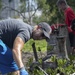 Sailors assist in a cleanup at the ancient fishpond, Loko Pa’aiau, on Oahu