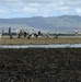 Sailors assist in a cleanup at the ancient fishpond, Loko Pa’aiau, on Oahu