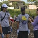 Sailors assist in a cleanup at the ancient fishpond, Loko Pa’aiau, on Oahu