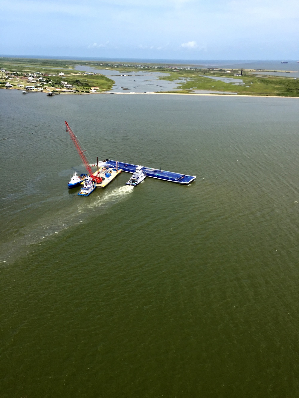 Responders prepare to move damaged barge after collision in Intracoastal Waterway