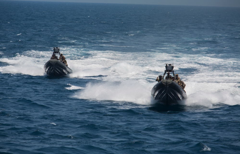 Force Recon Marines practice taking over ships at sea