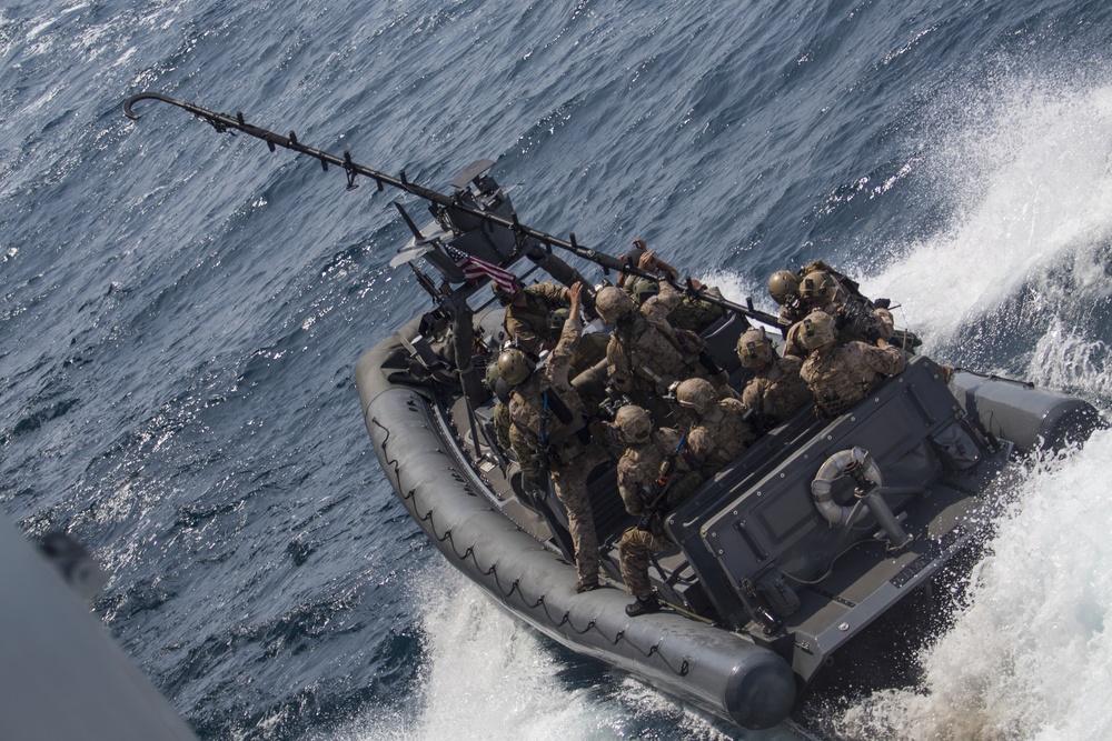 Force Recon Marines practice taking over ships at sea