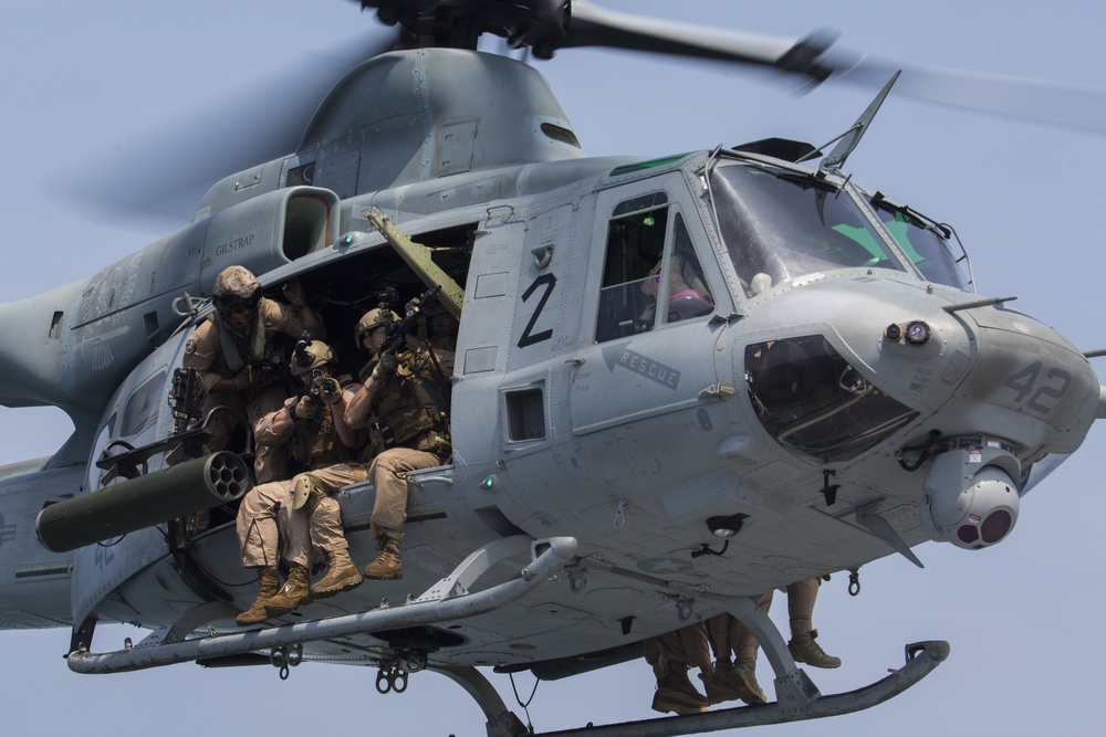 Force Recon Marines practice taking over ships at sea