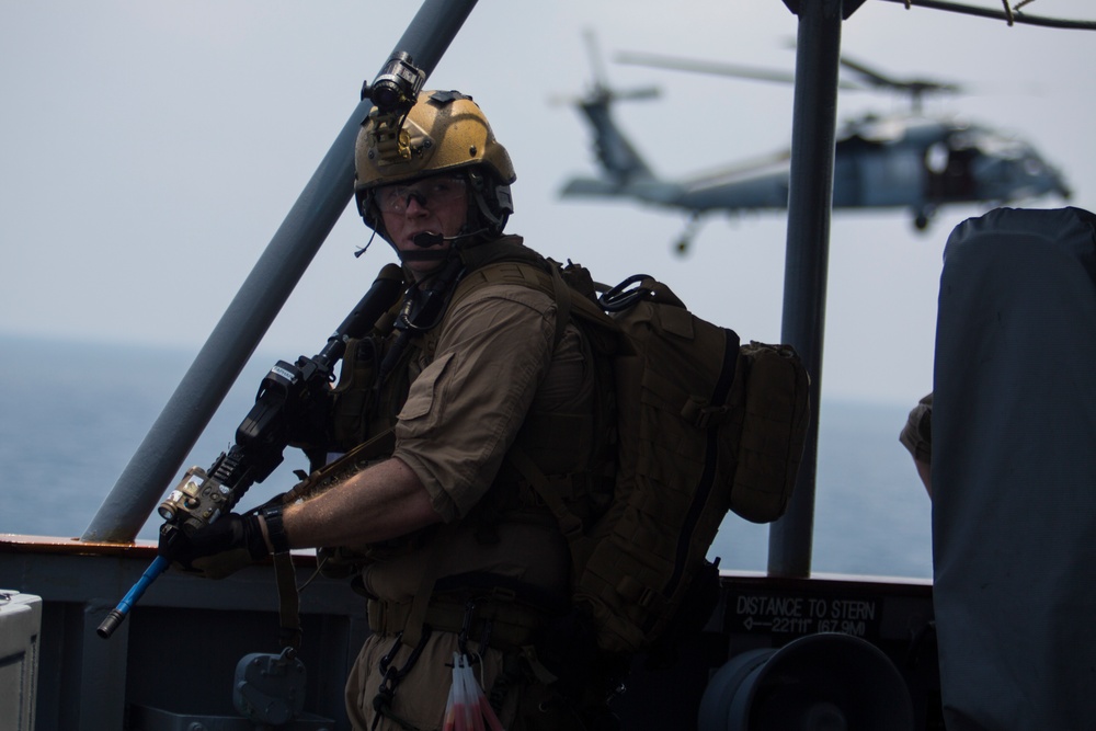 Force Recon Marines practice taking over ships at sea