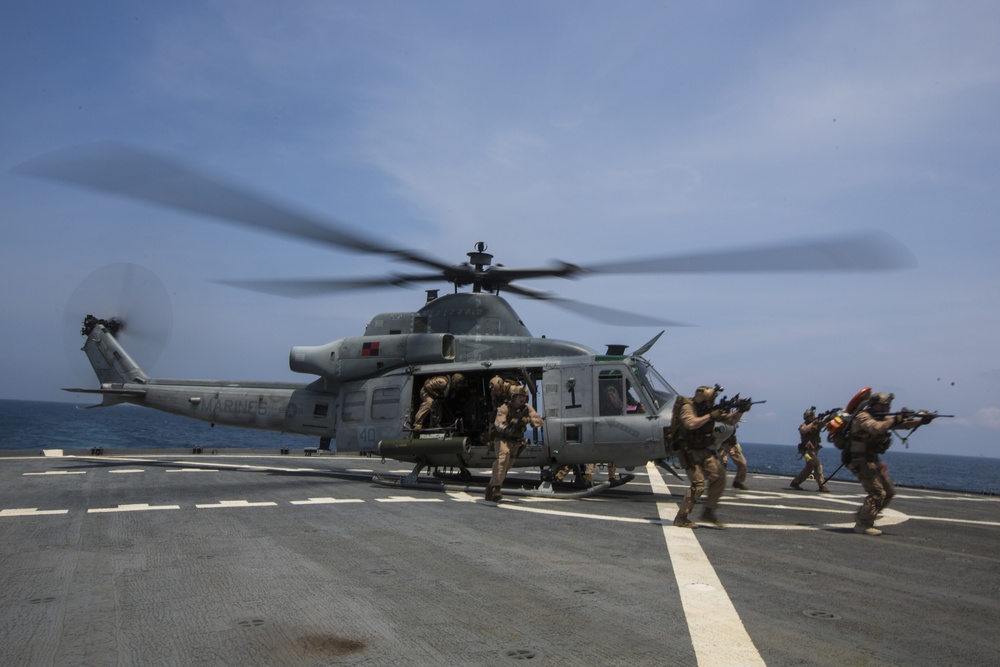 Force Recon Marines practice taking over ships at sea